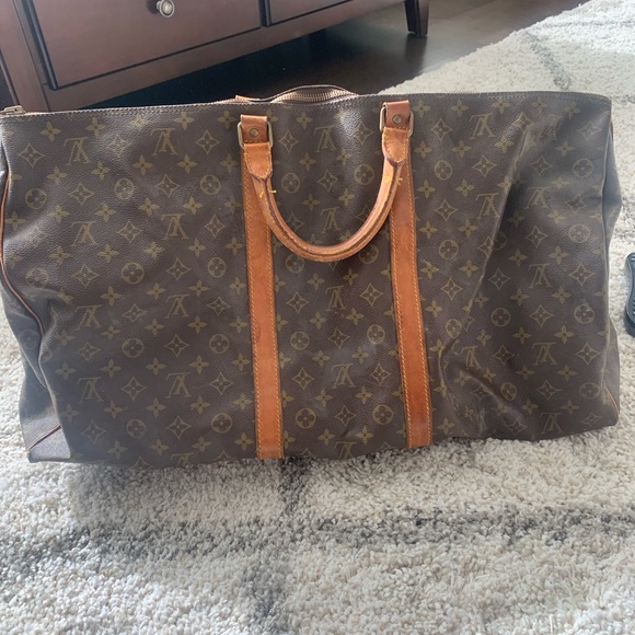 Louis Vuitton Handbags - Genuine vintage Louis Vuitton Monogram duffle Bag with Tan Leather Trim